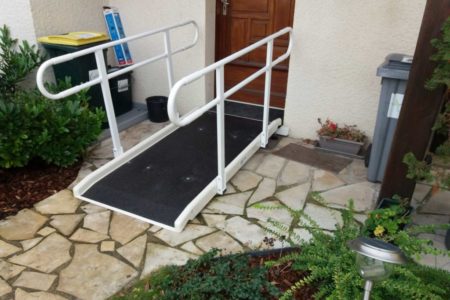 Single standard access ramp with two handrails