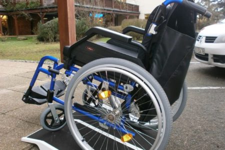 crossing a pavement with a manual wheelchair on a fibreglass travel ramp Jetmarine