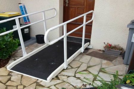 access to the house entrance with a fibreglass standard access ramp and two handrails