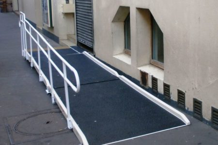 Access to a shop in town with a Jetmarine fibreglass standard access ramp and one handrail