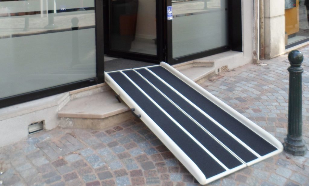 Briefcase ramp for two steps in an insurance office